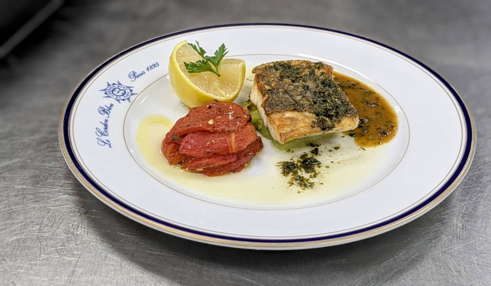 麥年式鱸魚排附烤番茄佐橄欖肉醬汁 (Sea Bass Meunière with Roasted Tomatoes)